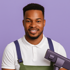 Smiling cleaning staff in uniform holding a vacuum