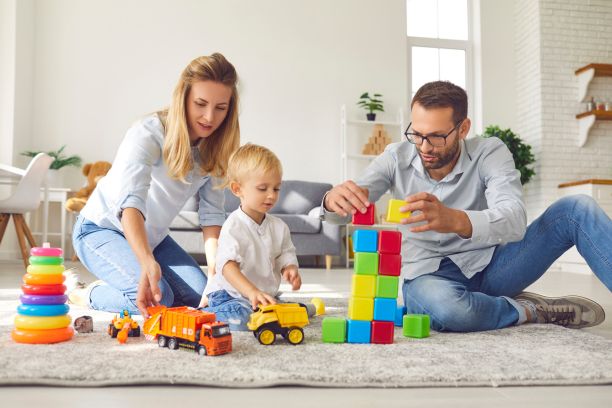 Parents and children relaxing together after professional house cleaning in Cambridge, Massachusetts
